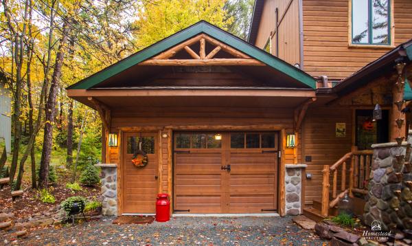 16' x 24' Custom log cabin-inspired garage with roughened german pine