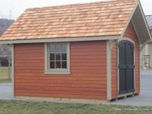 10' x 12' Garden Shed with a frame roof and mahogany stained siding