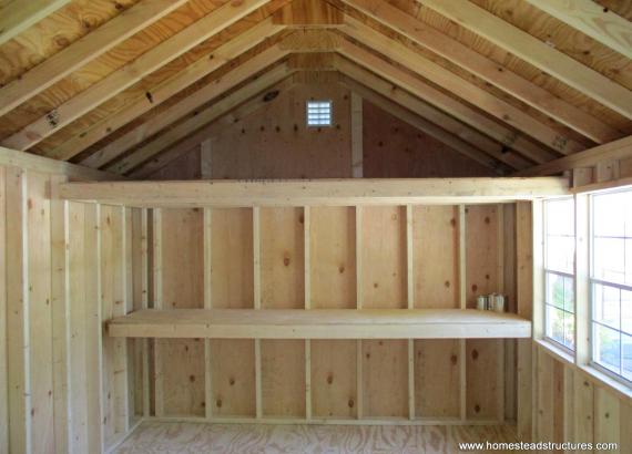 Interior of 10' x 14' Laure a-frame shed with potting bench