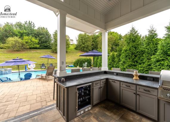 Outdoor Kitchen with Everlast HDPE Cabinets with Everlast HDPE Cabinets in 14' x 20' Attached Vintage Pavilion with Reverse Gable in Phoenixville, PA
