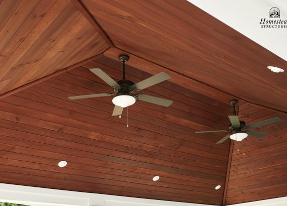 Mahogany stained T&G pine ceiling with ceiling fans on a 16' x 24' Vintage Pavilion in Norwood MA