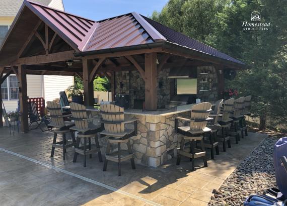 16' x 26' Timber Frame Pavilion with stone fireplace, bar & privacy wall