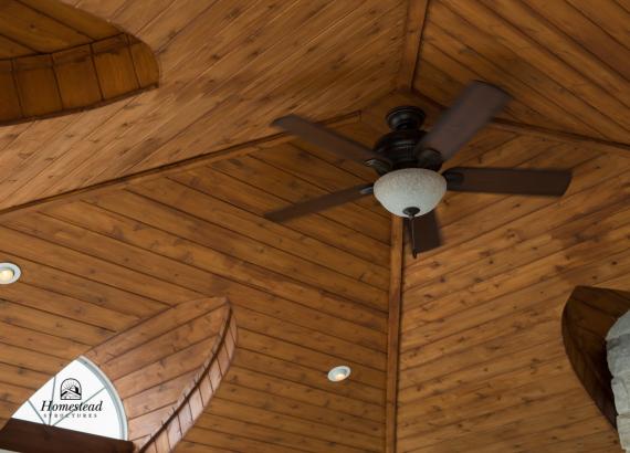Ceiling fan & light combo with stained wood ceiling of 18x18 custom vintage pavilion