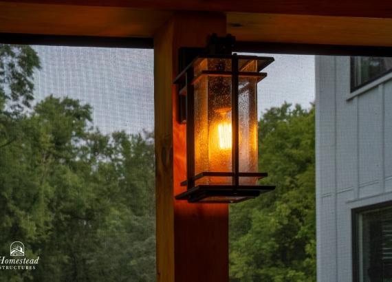 Porch light inside Attached 20' x 20' Timber Frame Pavilion with Timbertech Deck in Royersford