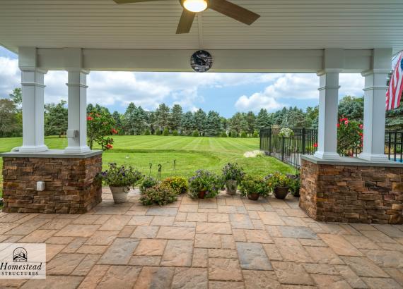 Backyard view from under a 20' x 30' Attached Patio Pavilion with Privacy Screen in Collegeville PA