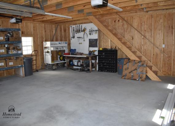 Interior with cement floor of 24' x 24' Classic 2-Car Attic Garage Display in New Holland