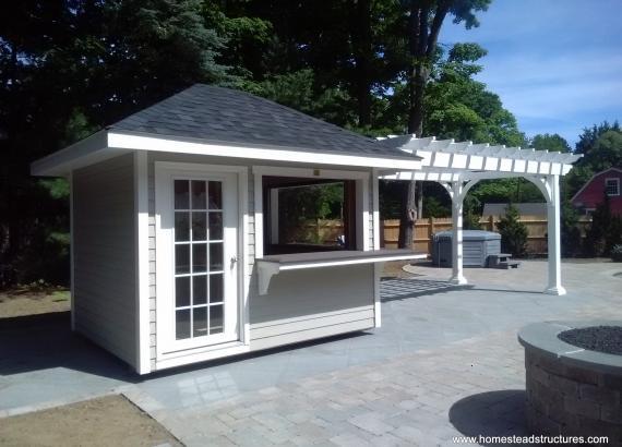 8 x 26 Hip roof pool shed & concession stand with vinyl pergola