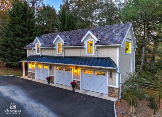 Aerial twilight photo of 21' x 43' 3-Car Garage in Wayne PA with gym and living space