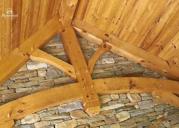 Timber Frame Rafters & Gable with Stone Wall