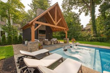 Pool house in backyard