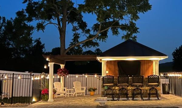 10' x 14' Siesta Pool Bar in Patterson NY Siesta Pool Bar at night with soft white lights