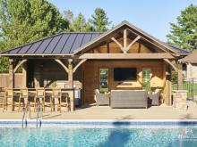 A Custom Timber Frame Pool House with Bar, Lounge, & Storage