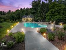 Twilight photo of 18x20 Custom Avalon Pool House in Wayne PA