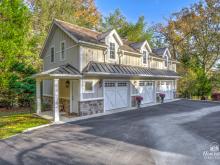 Exterior photo of a 21' x 43' 3-Car Garage in Wayne PA with gym and living space