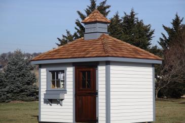 8' x 10' Classic Hip Rood Shed with birdhouse cupola & cedar shakes