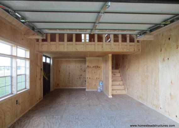 Interior of 1 Car Garage with stairs and attic loft