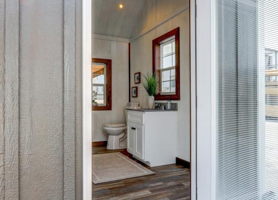 Finished bathroom & changing area of 10' x 14' A-Frame Siesta Poolside Bar with attached Pergola in New Holland PA