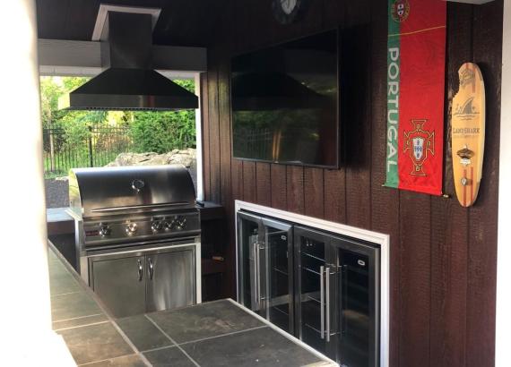 Bar area with grill and built in fridge of 10' x 14' Siesta Poolside Bar in Andover NJ