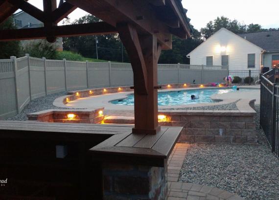 View of the pool from 12' x 14' Timber Frame Siesta Pool Bar in PA
