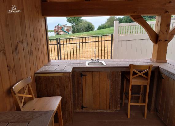 Bar area and cabinets of 12' x 14' Timber Frame Siesta Pool Bar in PA