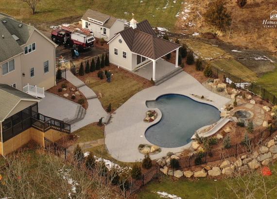 Birds eye view of backyard pool and custom Liberty pool house in Flemington NJ