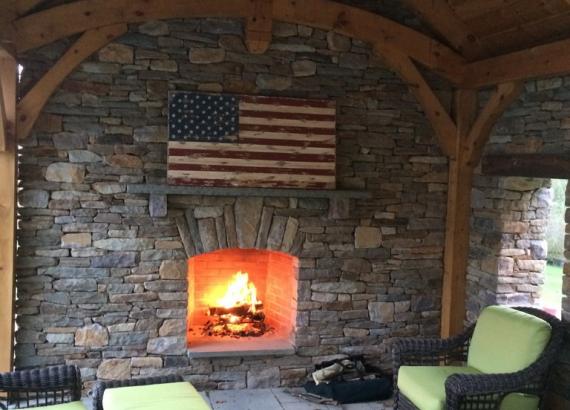 12x20 Timberframe Pavilion with Stone Wall & Fireplace Interior