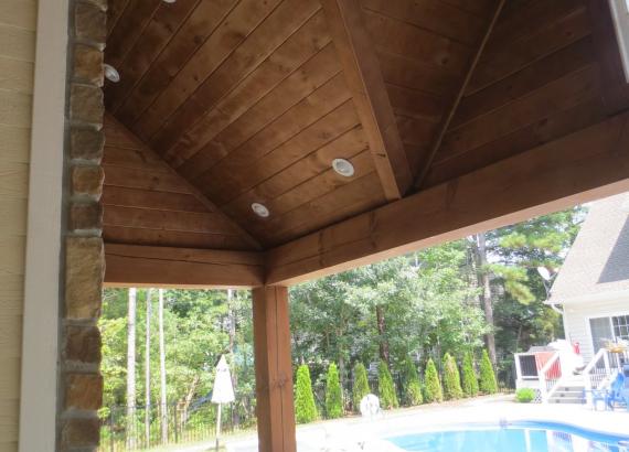 Bar shelves of 14' x 20' Custom Pool House with Stone facade in VA