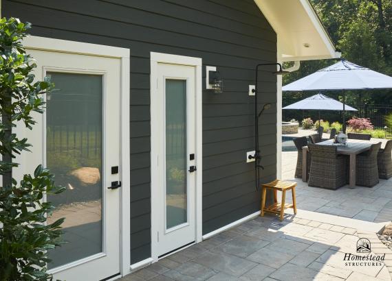 Doors to bathroom and kitchen of 14' x 24' A-Frame Avalon Pool House in West Nyack, NY