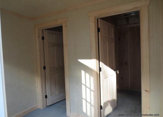 Finished Interior of 14' x 24' Liberty Dutch Barn with cedar shake siding