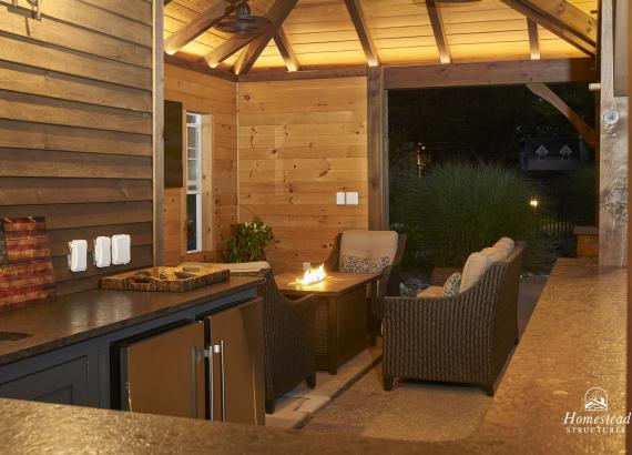 Night Shot of 14' x 27' Custom Timber Frame Avalon Pool House in PA