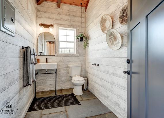 Bathroom of 14' x 28' Custom Timber Frame Avalon Pool House with metal roof in New Holland PA