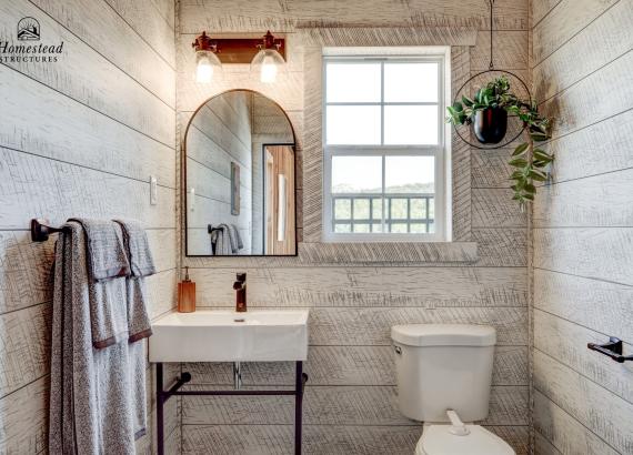 Bathroom of 14' x 28' Custom Timber Frame Avalon Pool House with metal roof in New Holland PA