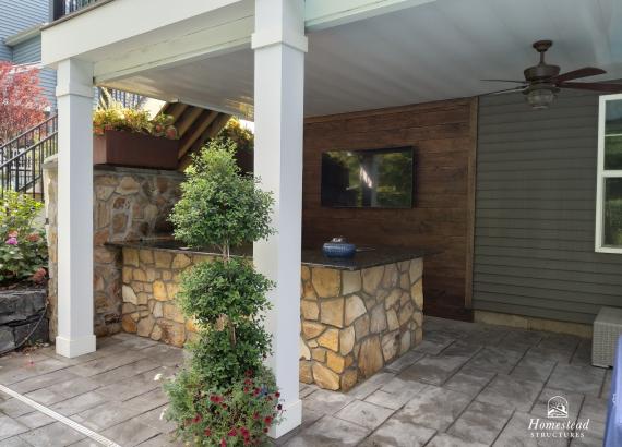 15' L Shaped Outdoor Bar with HDPE Cabinets, Granite Countertops and Stone façade in Chalfont PA