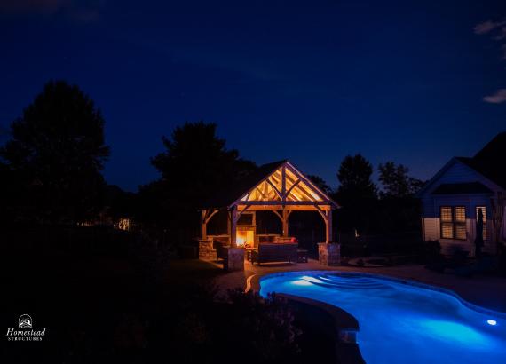Poolside 16' x 14' Timber Frame Pavilion in PA with fireplace