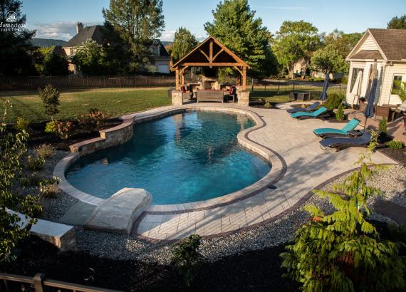 Poolside 16' x 14' Timber Frame Pavilion in PA with fireplace