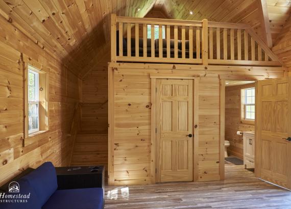 View of steps and loft inside a 16' x 24' Custom A-Frame Pool House in Monsey, NY 