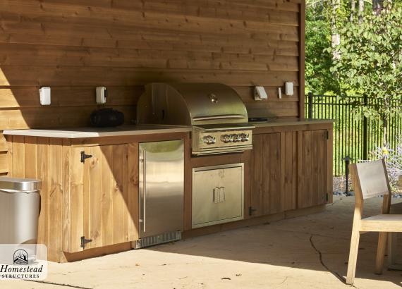 Outdoor bar & kitchen of 16' x 24' Timber Frame Avalon Pool House with Metal Roof in Quakertown, PA