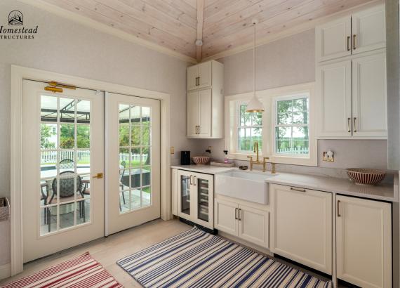 Kitchen area of 16' x 30' Luxury Hip Roof Pool House in Greenwich, Connecticut