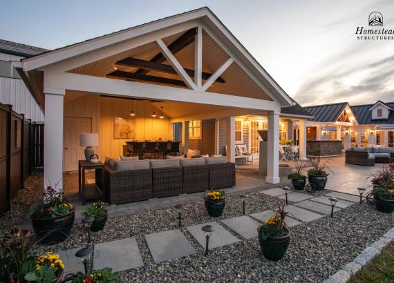 18' x 24' A-Frame Avalon Pool House with open Maple Leaf gable in Homestead Structures Outdoor Showroom