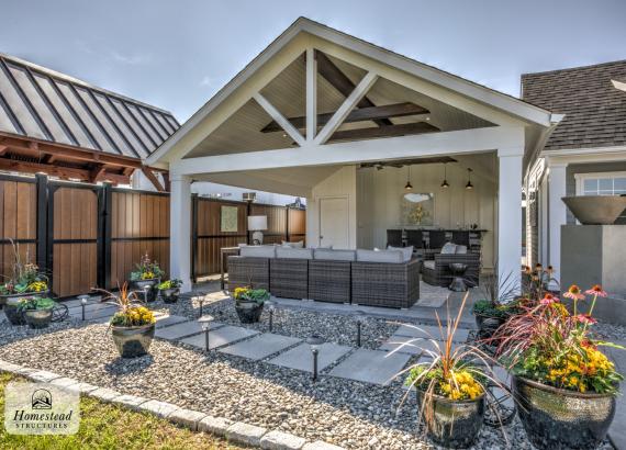 18' x 24' A-Frame Avalon Pool House with open Maple Leaf gable in Homestead Structures Outdoor Showroom