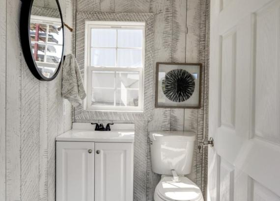 Bathroom of 18' x 24' A-Frame Avalon Pool House with open Maple Leaf gable in Homestead Structures Outdoor Showroom