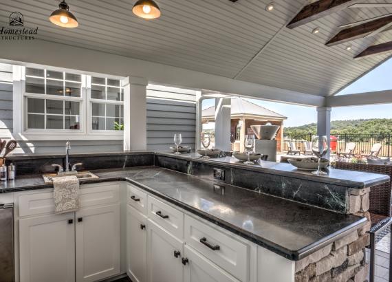 Bar counter of 18' x 24' A-Frame Avalon Pool House with open Maple Leaf gable in Homestead Structures Outdoor Showroom