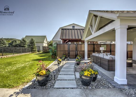 18' x 24' A-Frame Avalon Pool House with open Maple Leaf gable in Homestead Structures Outdoor Showroom