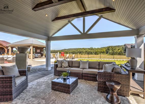 18' x 24' A-Frame Avalon Pool House with open Maple Leaf gable in Homestead Structures Outdoor Showroom