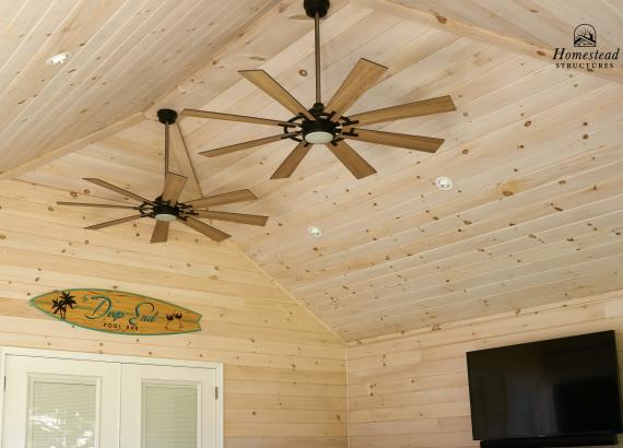 T&G Pine ceiling with custom ceiling fans and recessed lights in 18' x 24' Hip Roof Avalon Pool House in Harleysville PA