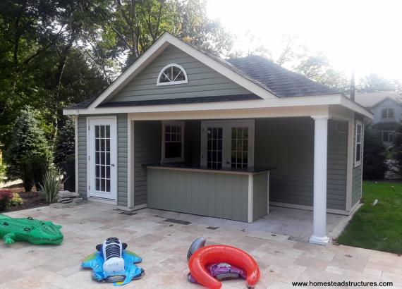 14' x 20' Wellington with hip roof and vinyl siding and porch bar