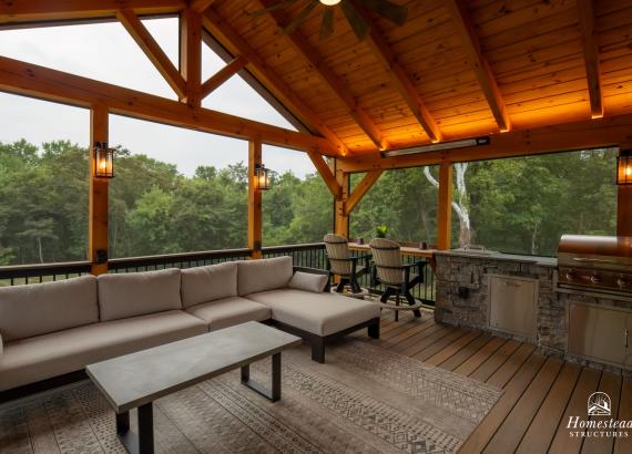 Lounge area of Attached 20' x 20' Timber Frame Pavilion with Timbertech Deck in Royersford