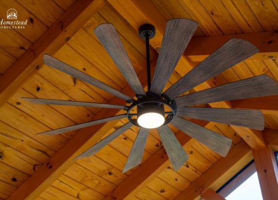 Custom ceiling fan in Attached 20' x 20' Timber Frame Pavilion with Timbertech Deck in Royersford