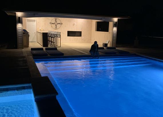 Night Shot of 20' x 24' Custom Avalon with Bar & Standing Seam Metal Roof in Lumberton NJ