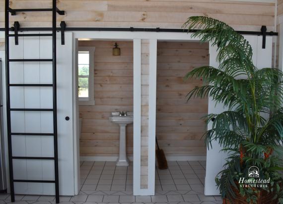 Bathroom & Storage Room in 20' x 24' Custom A-Frame Avalon Pool House Display in New Holland, PA